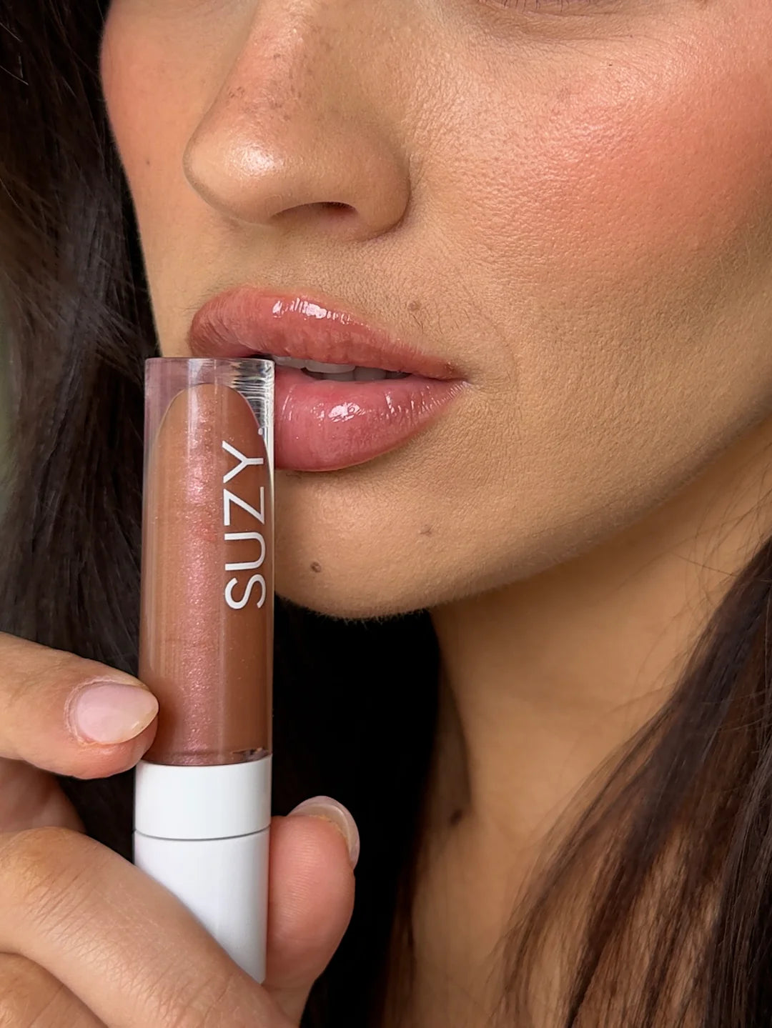 SUZY. GLOSS